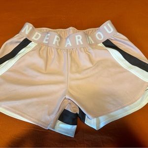 2 pairs of small women’s Under Armour shorts
